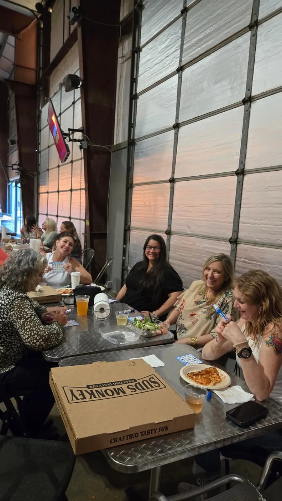 Guests enjoying Plant Bingo at Suds Monkey